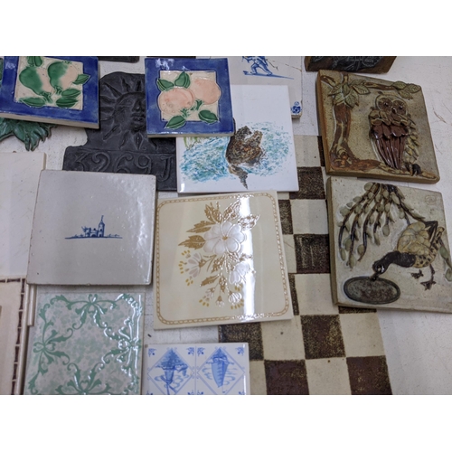 409 - Ceramic tiles to include 19th century examples also including some small stained glass window panels... 