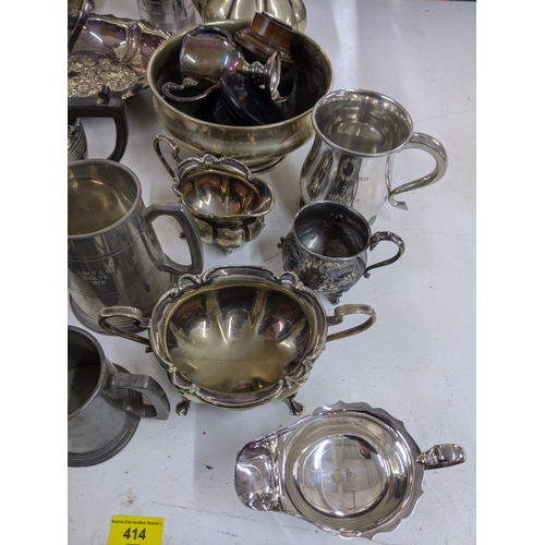 414 - Silver plated and EPNS items to include a coffee pot, tankards, teapots wine stands and other items
... 