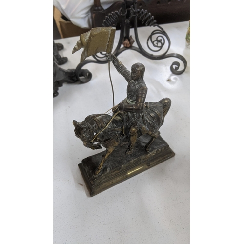 416 - Mixed metalware to include a continental cast metal figurine, a spelter figure of a soldier on horse... 