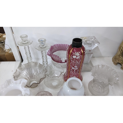 420 - Mixed glassware to include cranberry etched oil lamp shades, candlesticks and other items
Location:9... 