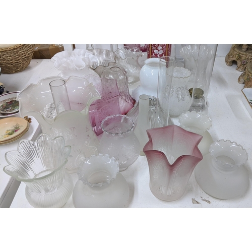 420 - Mixed glassware to include cranberry etched oil lamp shades, candlesticks and other items
Location:9... 