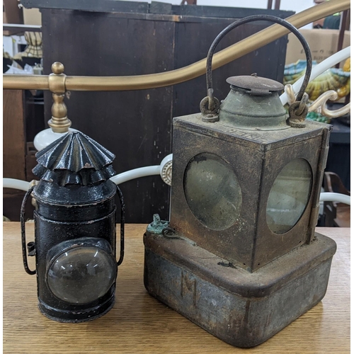 422 - A Victorian bullseye police lantern, together with a British Railway lantern
Location:A2M
If there i... 