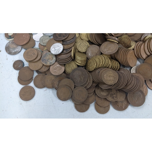 427 - A large collection of coins to include early 20th century pennies, three pennies and other English a... 