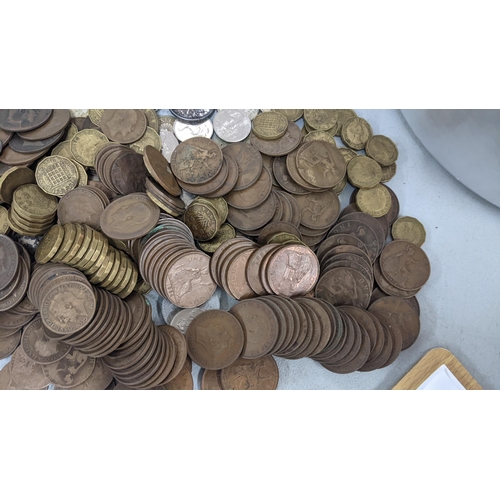 427 - A large collection of coins to include early 20th century pennies, three pennies and other English a... 