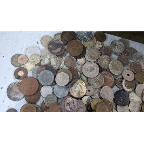 427 - A large collection of coins to include early 20th century pennies, three pennies and other English a... 