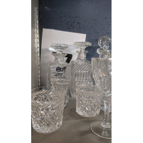 437 - Glassware to include Stuart crystal cut glass decanter and other crystal cut examples, along with va... 