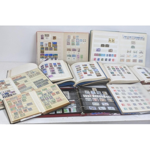 446 - A collection of part filled stamp albums from around the world to include examples from Jersey, Irel... 