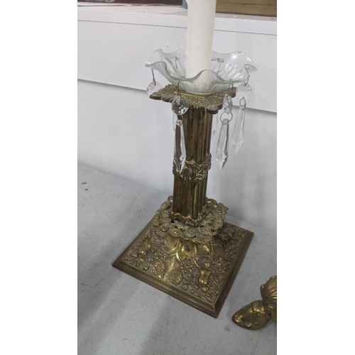 453 - Four brass candlesticks to include a 19th century ornate column example, and others
Location:10.1
If... 