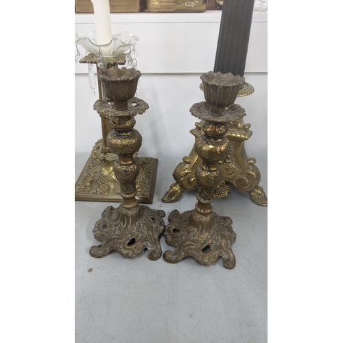 453 - Four brass candlesticks to include a 19th century ornate column example, and others
Location:10.1
If... 