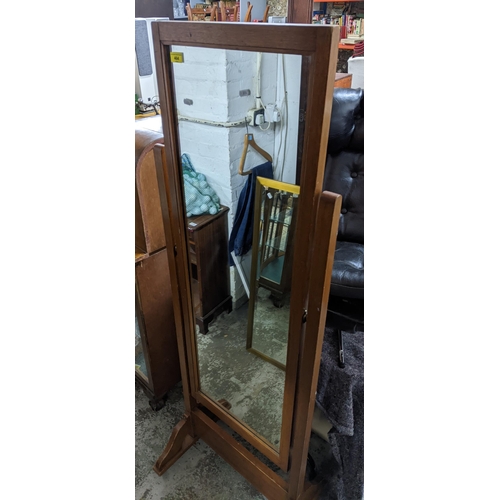 464 - A light mahogany framed cheval mirror, 165cm high Location:G
If there is no condition report shown, ... 