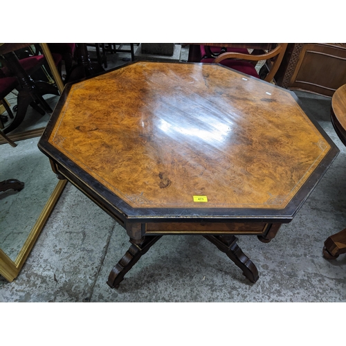 471 - A Victorian ascetics style table, quarter cut walnut octagonal top with engraved and ebonized border... 