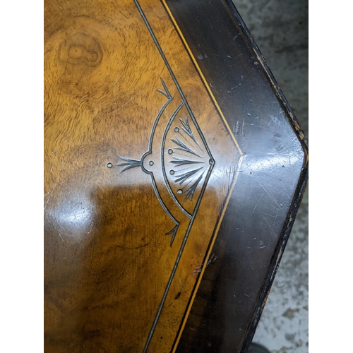 471 - A Victorian ascetics style table, quarter cut walnut octagonal top with engraved and ebonized border... 