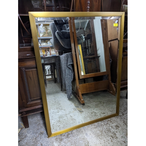 474 - A gold coloured metal framed wall mirror with rectangular bevelled glass, 102 x76.5cm
Location:G
If ... 