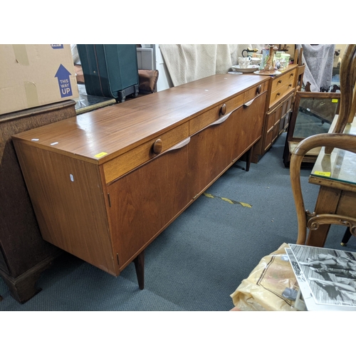 484 - An Elliots of Newbury retro teak sideboard, 75.5 high x 185.5 wide
Location:A4B
If there is no condi... 