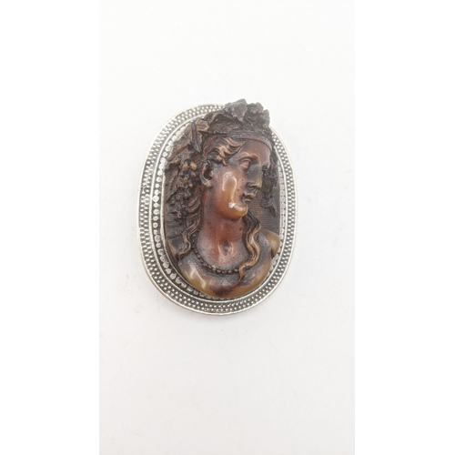 105 - Circa 1900 a Vulcanite high relief cameo brooch
Location:CAB4
If there is no condition report shown,... 