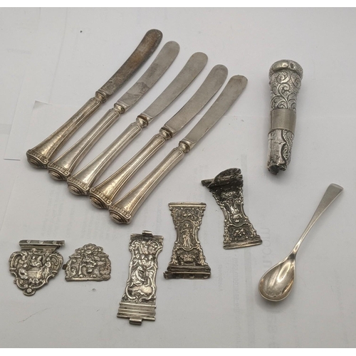 108 - Silver to include five silver handled butter knives, a teaspoon, white metal cast moulded hinges, A/... 