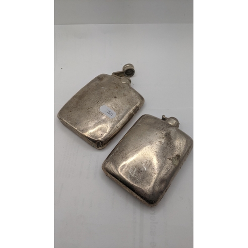 126 - Two silver flasks one hallmarked Sheffield 1919 both A/F, total weight 262.2g
Location:A3T
If there ... 