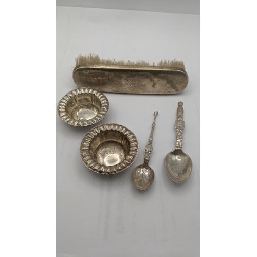 127 - Silver to include two pin dishes, a dressing table brush, a sterling silver spoon, inscribed 'Indian... 