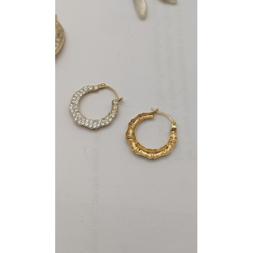 15 - Mixed 9ct gold and yellow metal to include two pairs of 9ct gold hoop earrings and a pair of screw b... 