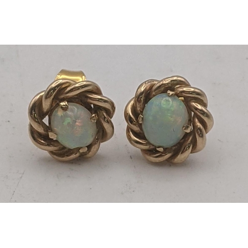 161 - A pair of yellow metal and opal earrings, tested as 9ct gold
Location:CAB4
If there is no condition ... 