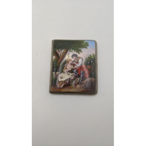 164 - A gold plated and enamel fronted cigarette case, having an engine turned back and enamel scene to th... 