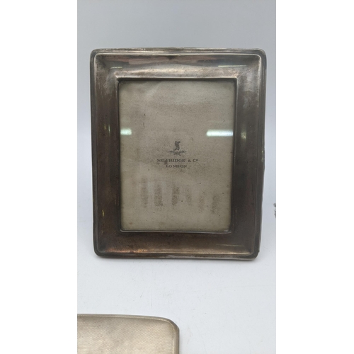 171 - An engine turned silver cigarette case made by W T Toghill & Co, hallmarked Birmingham 1936, 99.2g, ... 