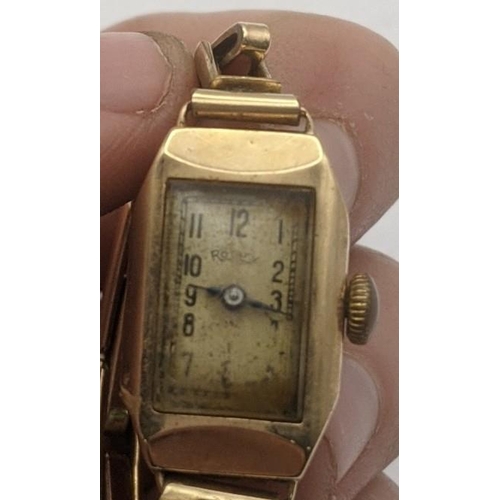 21 - A 9ct gold ladies Rotary manual wind wristwatch, on a gold plated expanding bracelet, total weight 1... 