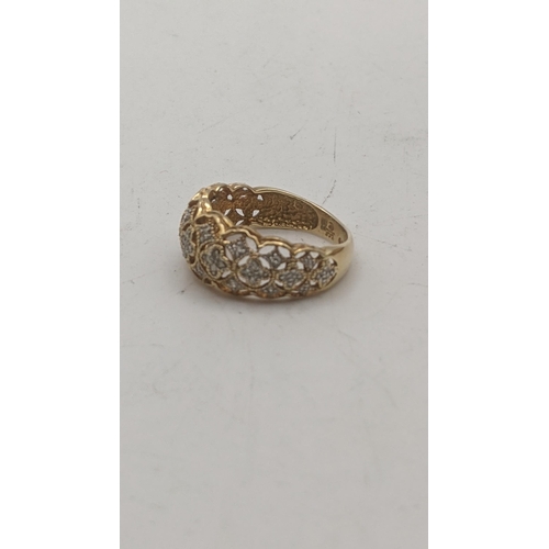 23 - A 14ct gold and diamond open patterned dress ring, size P, 3.4g
Location:CAB7
If there is no conditi... 