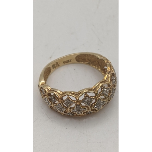 23 - A 14ct gold and diamond open patterned dress ring, size P, 3.4g
Location:CAB7
If there is no conditi... 