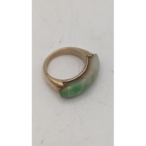 71 - A yellow gold and jadeite ring tested as 9ct gold size L ½ 7.2g
Location:RING
If there is no conditi... 