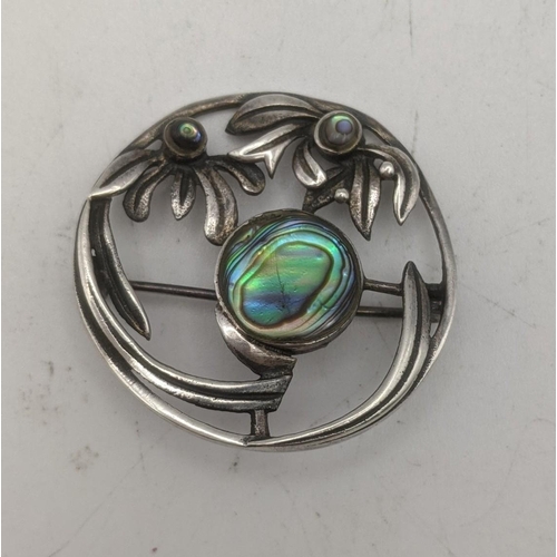 74 - A silver Liberty style opal set brooch
Location;CAB4
If there is no condition report shown, please r... 