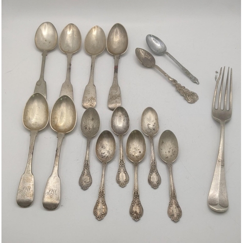 77 - Silver to include 5 fiddle pattern teaspoons, 6 sterling silver teaspoons and a fork total weight 26... 