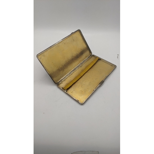 79 - An engine turned cigarette case having a gilt interior made by John Rose hallmarked Birmingham 1936,... 