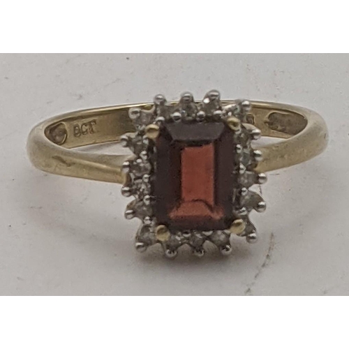 83 - A 9ct gold emerald cut garnet and diamond dress ring 3g size P½
Location:RING
If there is no conditi... 