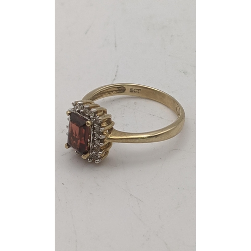 83 - A 9ct gold emerald cut garnet and diamond dress ring 3g size P½
Location:RING
If there is no conditi... 