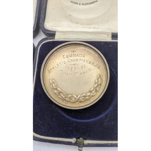 89 - Silver to include three trophies having gilt interior inscribed Malaya command athletic sports on wo... 