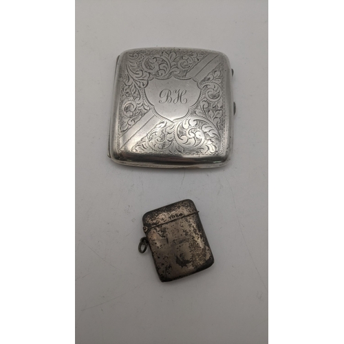 95 - A silver cigarette case having a floral engraved decoration, a central engraved initials with a gilt... 