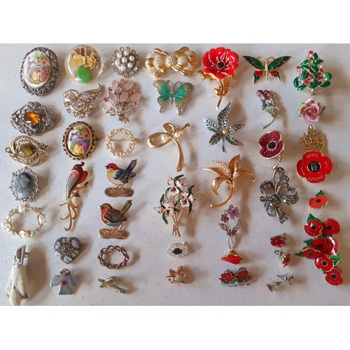 30 - A collection of vintage brooches to include enamelled examples, a Limoges brooch, a Scottish animal ... 