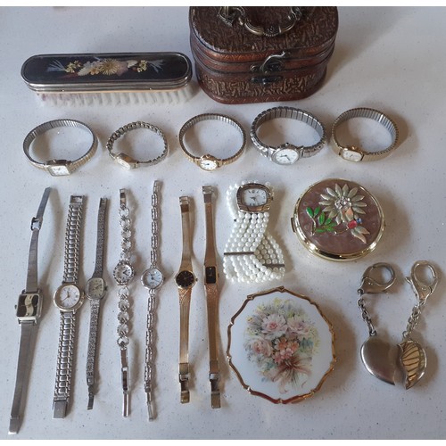 33 - A quantity of ladies watches to include Citizen, Sekonda and Accurist and dressing table items to in... 