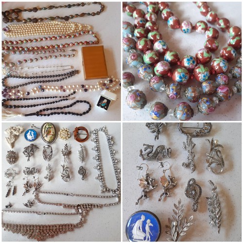 34 - A quantity of vintage costume jewellery, mainly necklaces and brooches, to include marcasite brooche... 