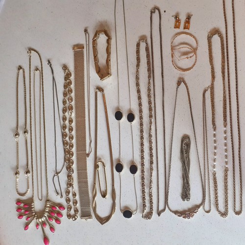 39 - A quantity of vintage and modern costume jewellery comprising 2 silver adjustable bangles, early 20t... 