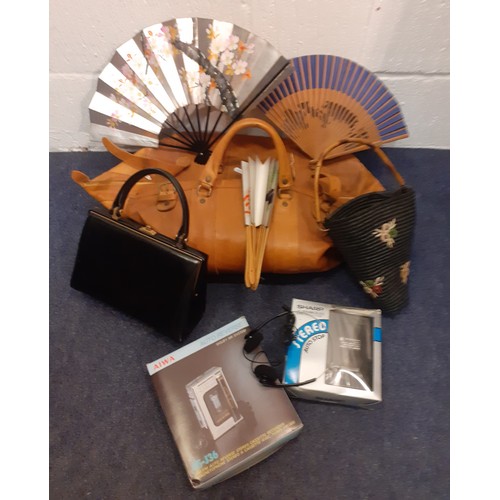 587 - A vintage brown leather weekend bag, 2 vintage handbags, 3 Oriental wooden and paper fans A/F and 2 ... 