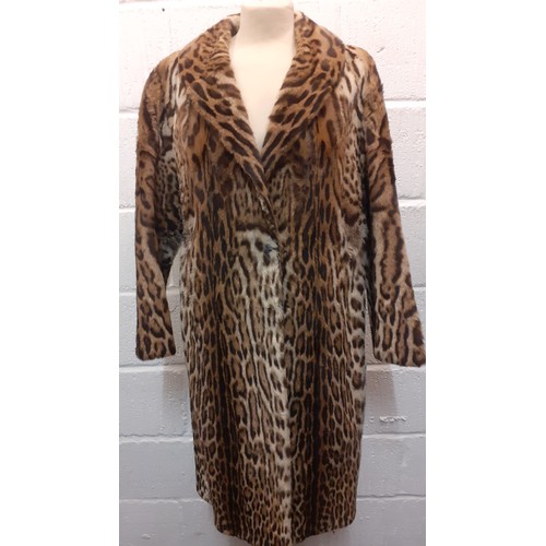 46 - A vintage ocelot fur coat, approx 40