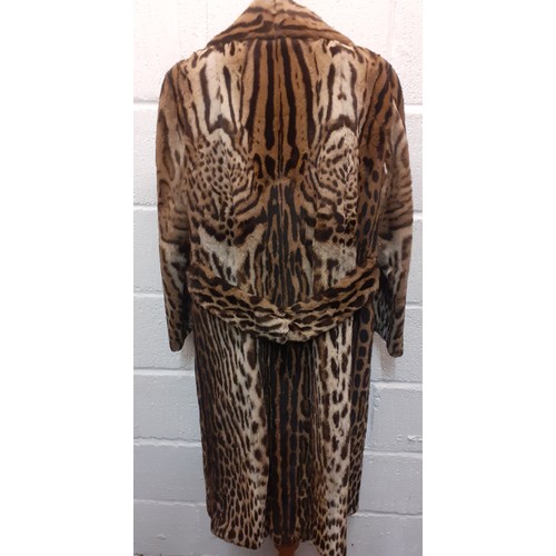 46 - A vintage ocelot fur coat, approx 40