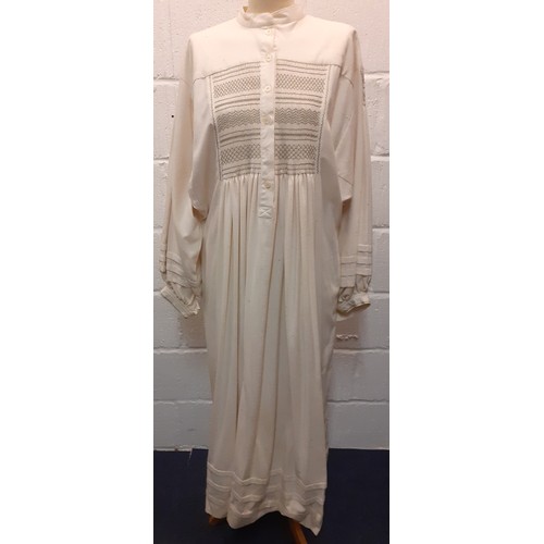 48 - A 1970's Julian Akers-Douglas, full length cream silk smock dress, approx 36/38