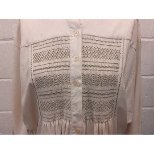 48 - A 1970's Julian Akers-Douglas, full length cream silk smock dress, approx 36/38