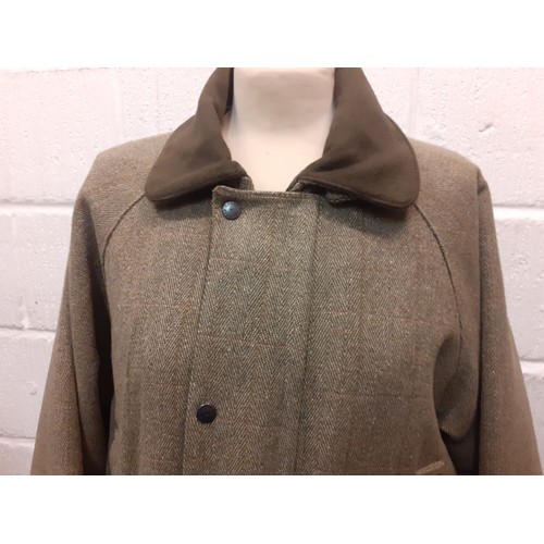 53 - A Bronte gents green Classic Countrywear coat, size Large, having a zip and press stud fastening, pa... 