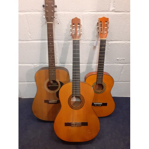 193 - Three classic guitars comprising an Encore TW350, a Narvaez Model 15 and another. Location:RWF
If th... 