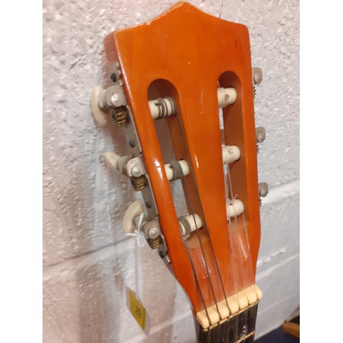 193 - Three classic guitars comprising an Encore TW350, a Narvaez Model 15 and another. Location:RWF
If th... 