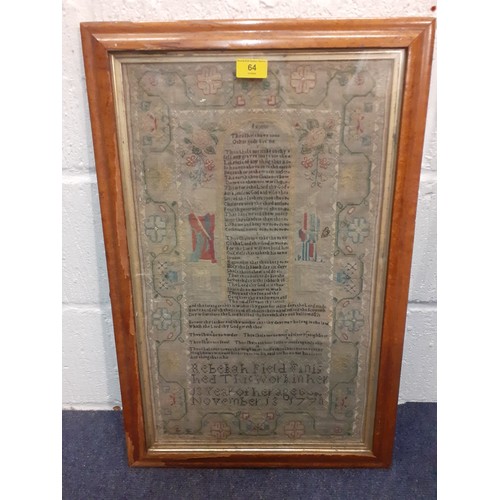 64 - A 1770 fine needlepoint on muslin sampler depicting religious verse from Exodus flanked by a male an... 